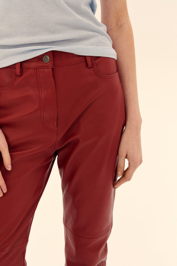(Large Glass of House Red) leather trousers, burgundy