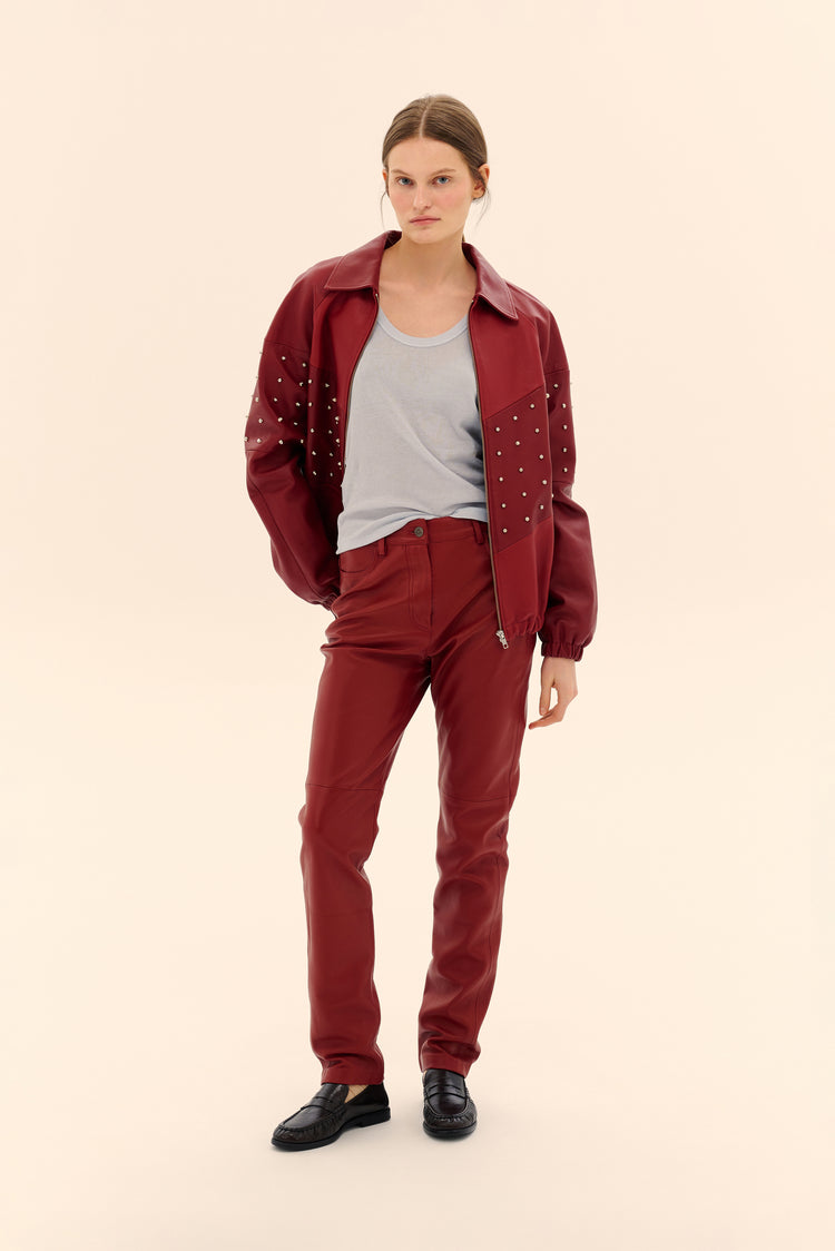 (Large Glass of House Red) leather trousers, burgundy